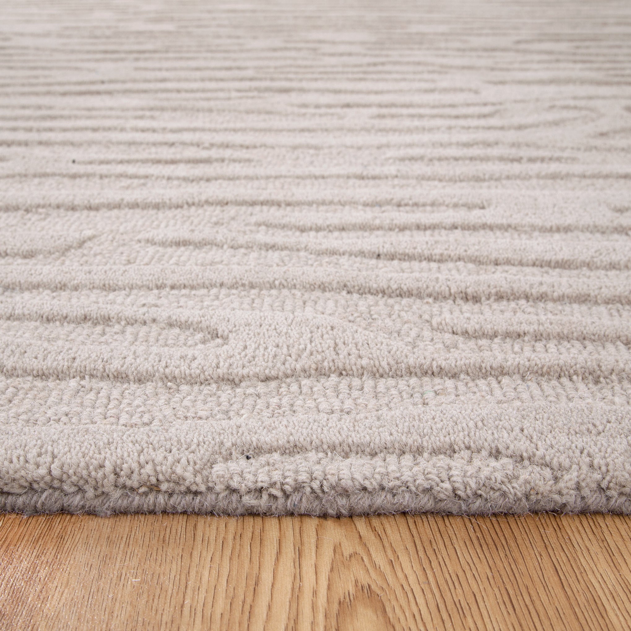 Les Nomades Sandstorm Beige Wool Rug